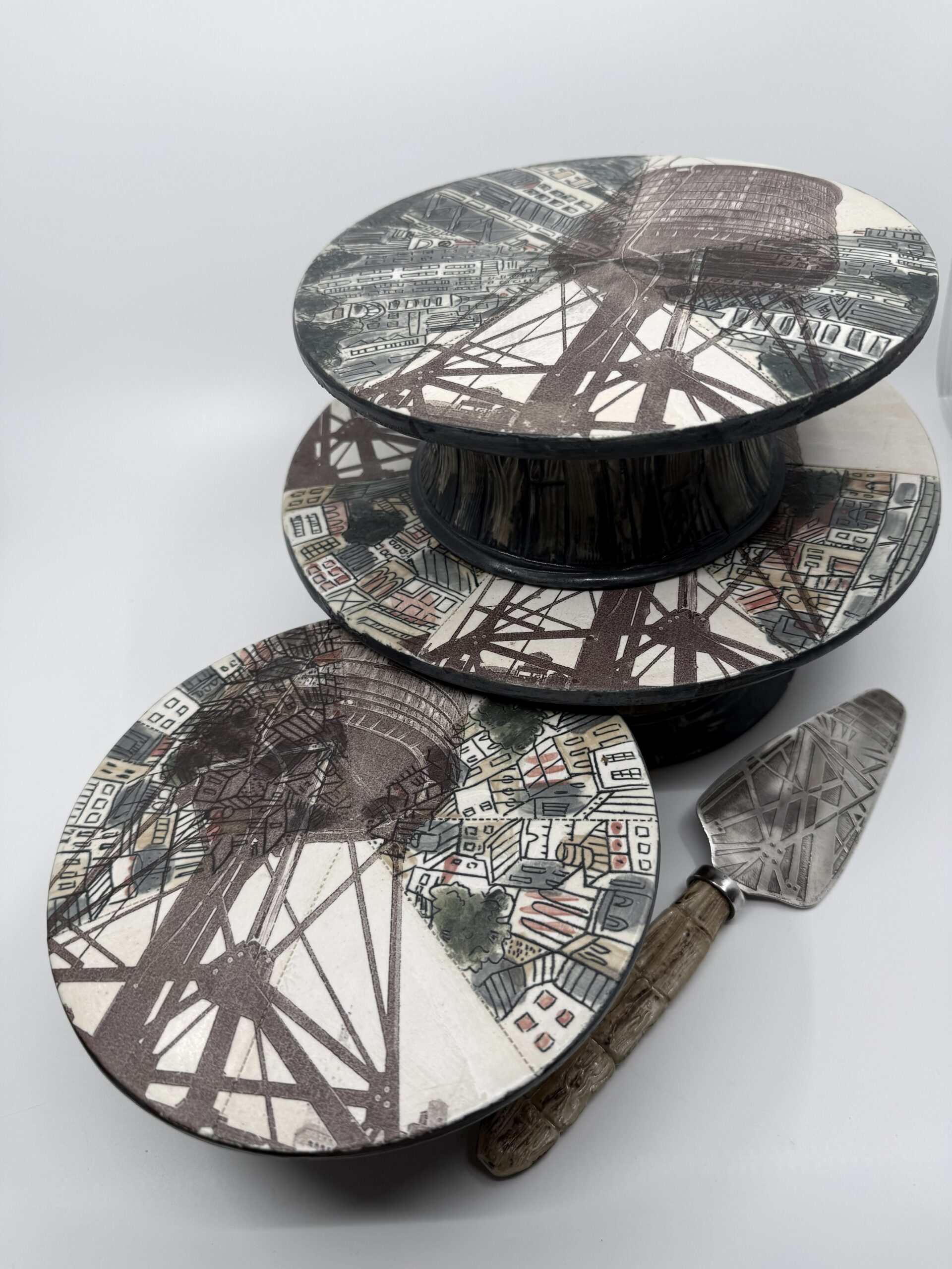 Oconnorsusan Tier Of Cake Plates With Server Scaled March 2026 Saints Sinners and Potters Ceramic Invitational