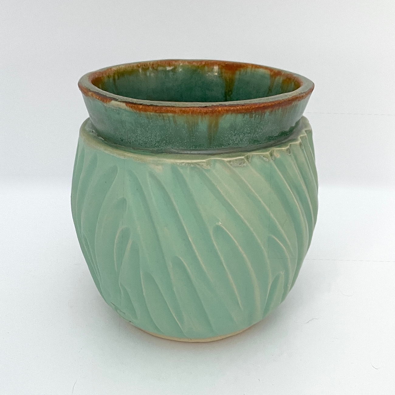 Thomsonjamie Antiquedcarvedvase March 2026 Saints Sinners and Potters Ceramic Invitational